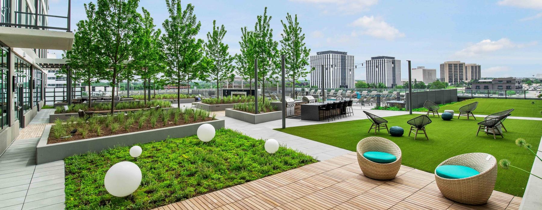 a courtyard with trees and benches